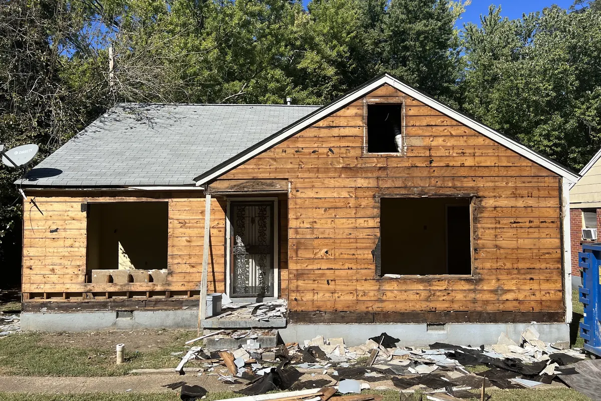 Front before renovation, 1950s 3-bed, 2-bath in Sherwood Forest
