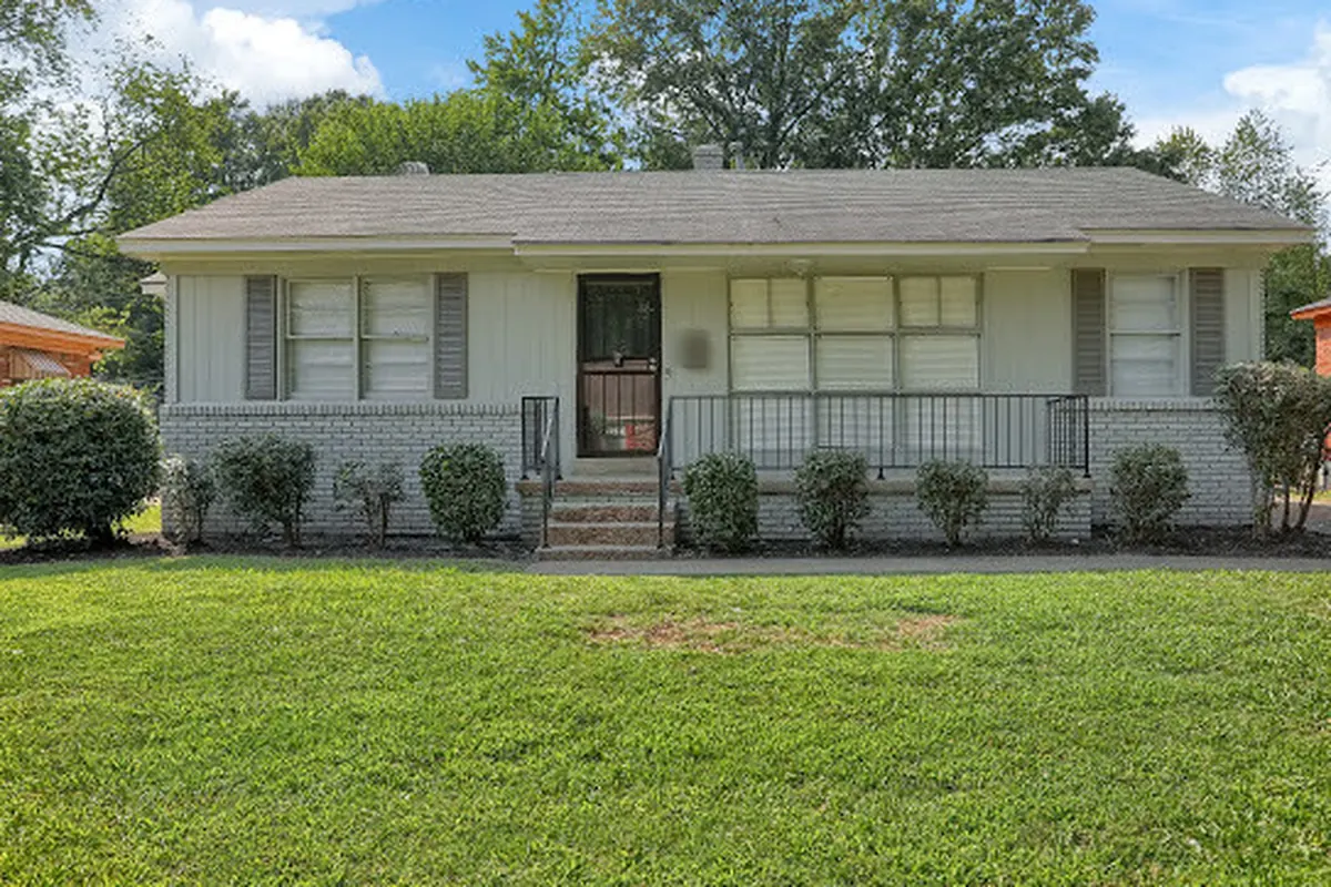 Front after renovation, 1950s 3-bed, 1.5-bath in Sherwood Forest